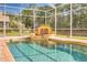 Home's pool and fountain at 4873 Quill Ct, Palm Harbor, FL 34685