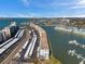 Panoramic aerial view of condominium community, showing boat access, parking, and intracoastal water at 5925 Shore S Blvd # 406, Gulfport, FL 33707