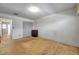 Bedroom featuring neutral colored walls, closet with folding doors, carpeted floor, and wood cabinet at 5925 Shore S Blvd # 406, Gulfport, FL 33707