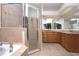 Bathroom featuring a large shower, soaking tub, and granite vanity at 6222 Kingbird Manor Dr, Lithia, FL 33547