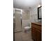 Cozy bathroom featuring glass shower, granite countertop, and vessel sink at 6222 Kingbird Manor Dr, Lithia, FL 33547