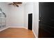 Bedroom featuring hardwood floors, a ceiling fan, and an arched window at 6222 Kingbird Manor Dr, Lithia, FL 33547