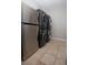 Laundry room featuring washer, dryer, and a stainless steel refrigerator at 6222 Kingbird Manor Dr, Lithia, FL 33547