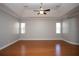 The living room features sleek hardwood floors and recessed lighting at 6222 Kingbird Manor Dr, Lithia, FL 33547