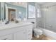 Clean bathroom featuring a shower-tub combination, and a white vanity at 7284 Pebble Beach Ln, Seminole, FL 33777