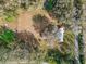 Aerial view of the property, displaying its treed boundaries and expansive size at 8408 Bob Wiggs Ave, Lithia, FL 33547