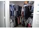 Walk-in closet features ample storage and organization for clothes, shoes, and accessories at 8731 Boysenberry Dr, Tampa, FL 33635