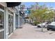 Inviting retail shops including 'YogaSix' and 'Serenity Salon & Spa' on a charming streetscape at 8731 Boysenberry Dr, Tampa, FL 33635