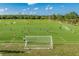 Active soccer field featuring players, goals, and well-maintained turf at 8731 Boysenberry Dr, Tampa, FL 33635