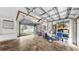 Spacious garage with ample storage shelving at 140 Sage Cir, Crystal Beach, FL 34681