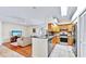Living room featuring an open floor plan and stainless steel appliances, perfect for entertaining at 140 Sage Cir, Crystal Beach, FL 34681
