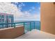 Balcony overlooking the ocean, offering a tranquil outdoor space with railings and tile flooring at 1520 Gulf Blvd # Ph1 1901, Clearwater Beach, FL 33767