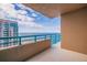 Breathtaking ocean view from the balcony, featuring turquoise railings and clear blue skies at 1520 Gulf Blvd # Ph1 1901, Clearwater Beach, FL 33767