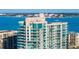 A detailed view of a condo building with multiple balconies and windows, offering ocean views at 1520 Gulf Blvd # Ph1 1901, Clearwater Beach, FL 33767