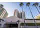 Luxury high-rise condominium with underground parking garage and palm trees at 1520 Gulf Blvd # Ph1 1901, Clearwater Beach, FL 33767