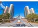 Stunning exterior of a condo complex with lush landscaping and a grand entrance at 1520 Gulf Blvd # Ph1 1901, Clearwater Beach, FL 33767