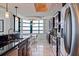 Modern kitchen features stainless appliances and breakfast bar at 1520 Gulf Blvd # Ph1 1901, Clearwater Beach, FL 33767