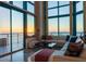 Bright living room with floor-to-ceiling windows and ocean view at 1520 Gulf Blvd # Ph1 1901, Clearwater Beach, FL 33767