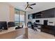 Functional office featuring built-in storage, modern desk setup, and balcony access with ocean views at 1520 Gulf Blvd # Ph1 1901, Clearwater Beach, FL 33767