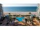 Beautiful oceanfront pool with lush landscaping and ample seating, offering a serene and luxurious retreat at 1520 Gulf Blvd # Ph1 1901, Clearwater Beach, FL 33767