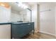 Bathroom featuring a vanity with ample storage and a stylish countertop and faucet at 18663 Kerrville Cir, Port Charlotte, FL 33948
