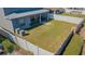 A well-maintained fenced backyard with a covered patio is perfect for outdoor entertaining at 2111 Roanoke Springs Dr, Ruskin, FL 33570