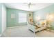 ' bedroom with soft green walls, carpet flooring, a ceiling fan, and a window with blinds at 2111 Roanoke Springs Dr, Ruskin, FL 33570