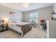 Cozy bedroom featuring neutral paint, carpet and natural light with a relaxing atmosphere at 2111 Roanoke Springs Dr, Ruskin, FL 33570