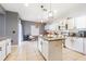 Stylish kitchen with white cabinets, granite countertops, and stainless steel appliances at 2111 Roanoke Springs Dr, Ruskin, FL 33570