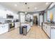 Bright kitchen with stainless steel appliances and a center island at 2111 Roanoke Springs Dr, Ruskin, FL 33570