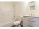 Bathroom featuring a shower/tub combination, modern fixtures, and a stylish vanity at 28 Caddy Rd, Rotonda West, FL 33947