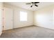 Spacious bedroom with neutral carpet and large windows allowing ample natural light at 28 Caddy Rd, Rotonda West, FL 33947