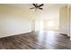 Bright and spacious living room featuring modern flooring and ample natural light at 28 Caddy Rd, Rotonda West, FL 33947