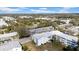 Aerial view of a community offering convenient parking and well-maintained landscaping at 300 Glennes Ln # 203, Dunedin, FL 34698