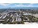Scenic aerial view of a building complex surrounded by lush foliage near the bay at 300 Glennes Ln # 203, Dunedin, FL 34698