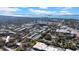 An aerial view of a community nestled among lush greenery and overlooking the bay at 300 Glennes Ln # 203, Dunedin, FL 34698