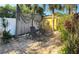 Inviting backyard with lounge chairs, tropical plants, and decorative accents for outdoor relaxation at 4710 22Nd N Ave, St Petersburg, FL 33713