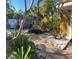 Backyard landscaping featuring brick pavers, mature trees and garden plants at 4710 22Nd N Ave, St Petersburg, FL 33713