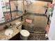 Bathroom featuring a tiled shower, granite countertop, and a mosaic tile floor at 4710 22Nd N Ave, St Petersburg, FL 33713