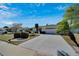 Lovely single-story home with a well-kept lawn, driveway, and neatly trimmed bushes at 612 Allegheny Dr, Sun City Center, FL 33573