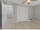 Bedroom features include ample closet space, ceiling fan, and light wood-look flooring at 710 Treasure Boat Way, Sarasota, FL 34242