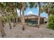 Private enclosed pool framed by lush landscaping at 710 Treasure Boat Way, Sarasota, FL 34242