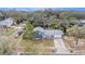 Aerial shot showcases the property's landscaped yard and neighborhood setting at 8019 Capwood Ave, Temple Terrace, FL 33637