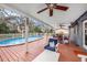 Spacious pool deck with lounge and dining areas, great for outdoor living at 8019 Capwood Ave, Temple Terrace, FL 33637