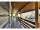 Relaxing covered wooden deck with an outdoor view at 8204 Stoner Rd, Riverview, FL 33569