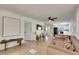 Bright and airy living room with modern furnishings and hardwood floors at 8204 Stoner Rd, Riverview, FL 33569