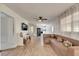 Open-concept living room featuring modern furnishings and a ceiling fan at 8204 Stoner Rd, Riverview, FL 33569
