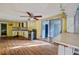 Open kitchen area with stainless steel appliances and a breakfast bar at 9435 Ottawa St, New Port Richey, FL 34654