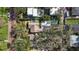 Overhead view of the property showcasing a beautifully maintained backyard, patio, and surrounding area at 114 27Th N Ave, St Petersburg, FL 33704