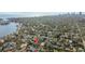 Aerial view of a residential area near a bay with downtown city views in the background at 114 27Th N Ave, St Petersburg, FL 33704